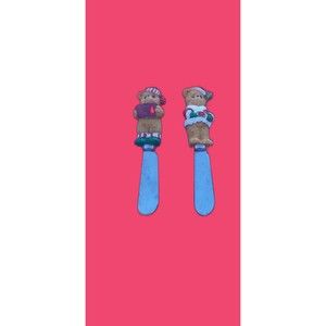 Vintage pair of Christmas teddy bear butter or cheese spreading knives